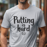 Load image into Gallery viewer, Funny Golf Shirt Men, Gift for Golfer, Golf Shirt Gift For Husband, Golf Gift For Dad, Golf Tshirt for Men, Golf Lover Gift, Putting Is Hard Shirt						Unisex Jersey Short Sleeve Tee
